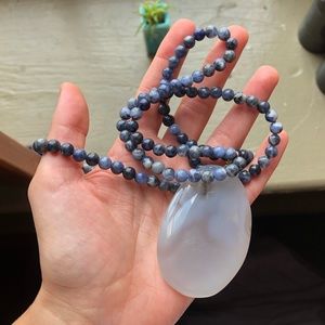 Beaded necklace with stone pendant